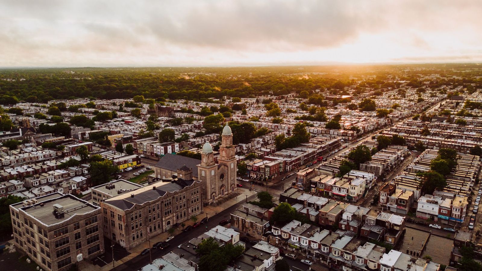 An aerial view of South Philadelphia rowhouses at sunset