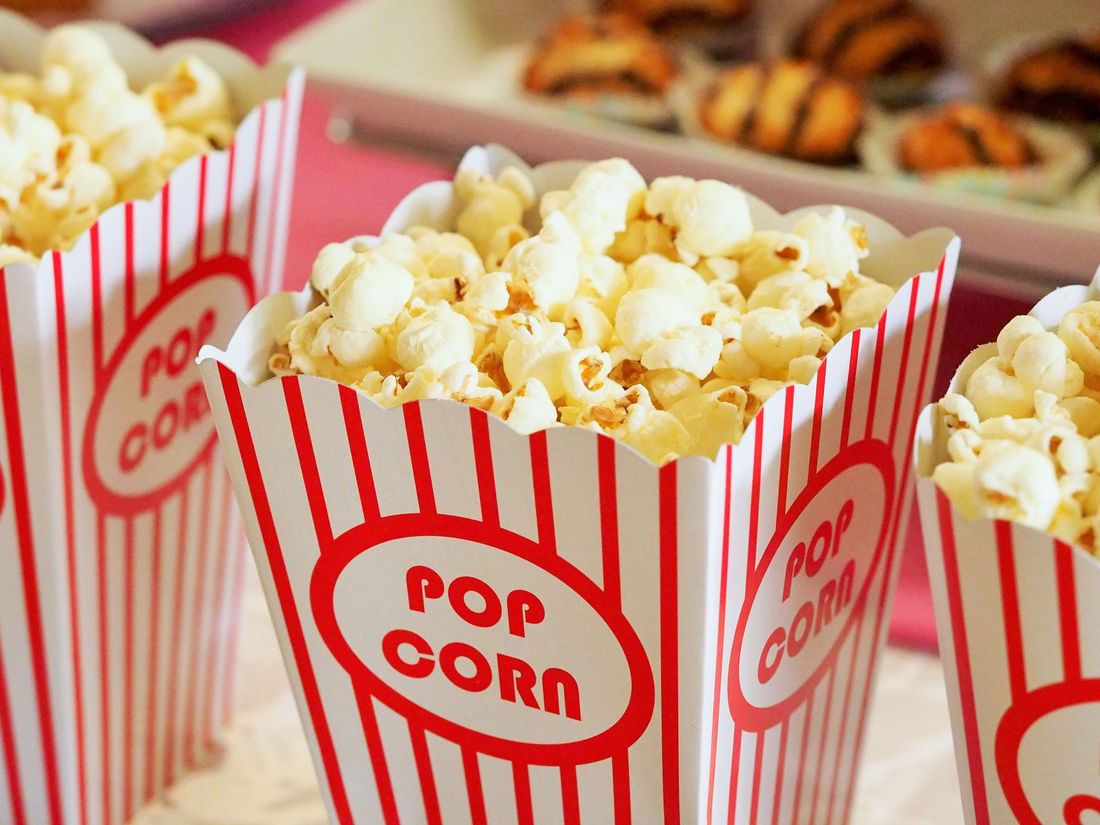 Popcorn in red and white striped boxes